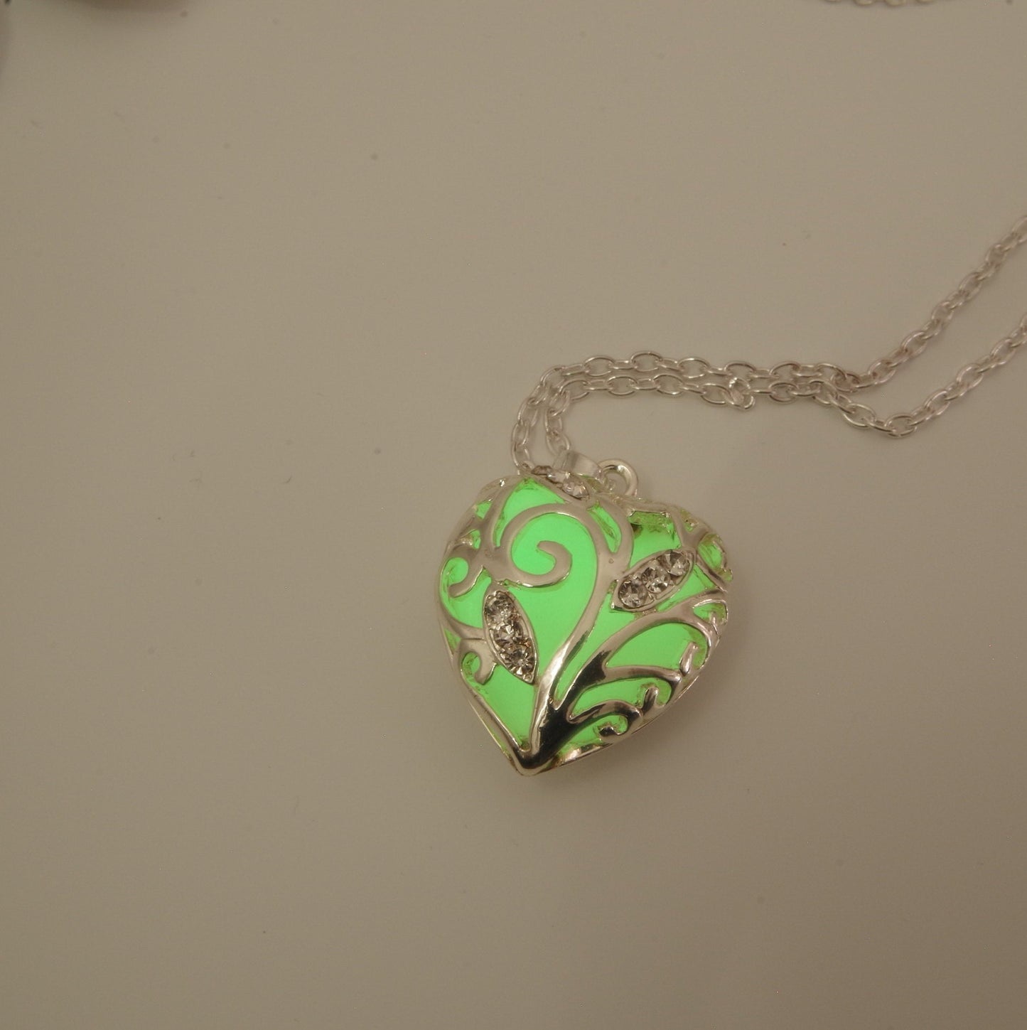 Glow heart necklace Glowing heart of winter jewelry Green heart  glow in the dark Pendant Frozen heart necklace Christmas gift