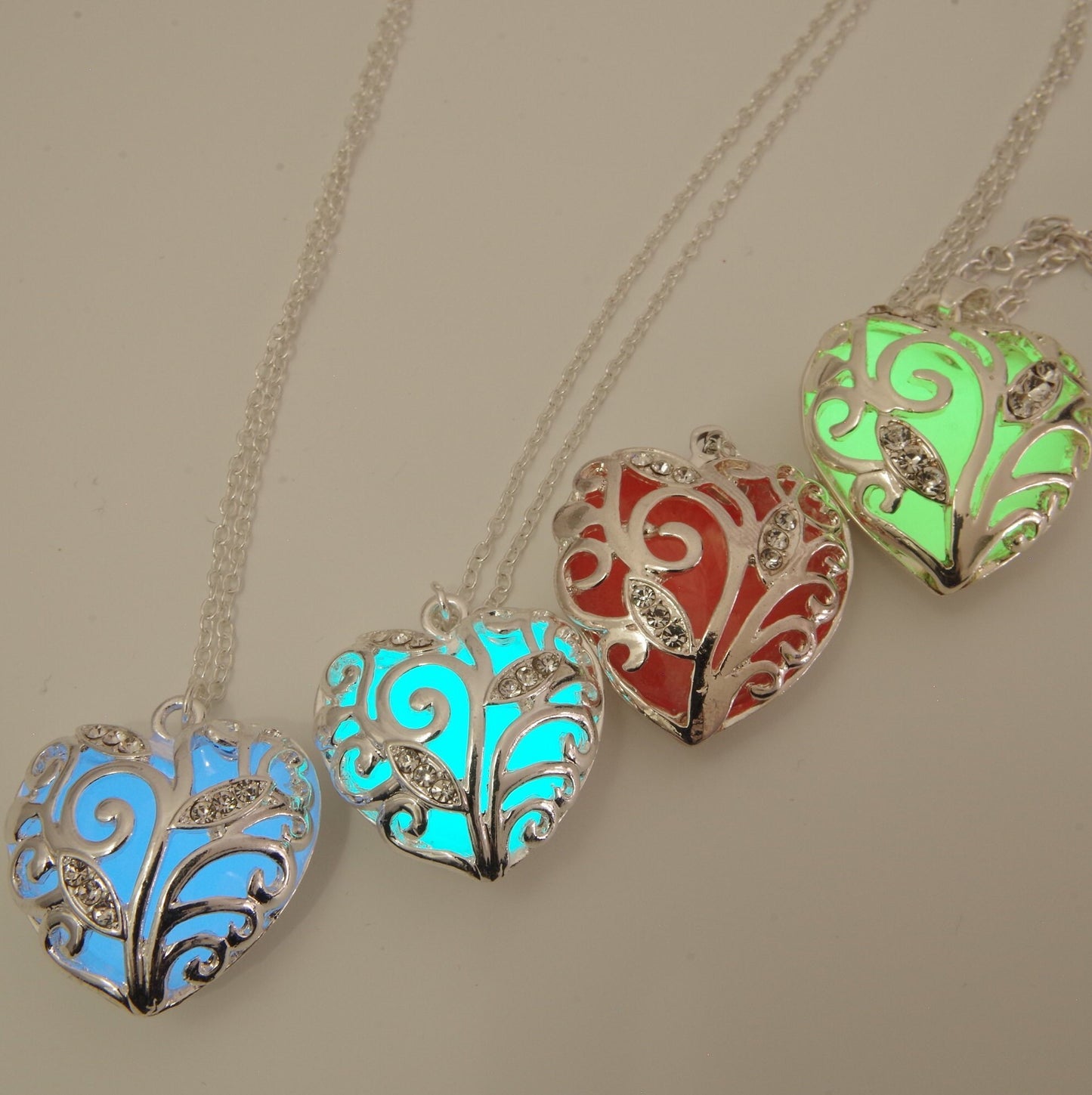 Glow heart necklace Glowing heart of winter jewelry Green heart  glow in the dark Pendant Frozen heart necklace Christmas gift