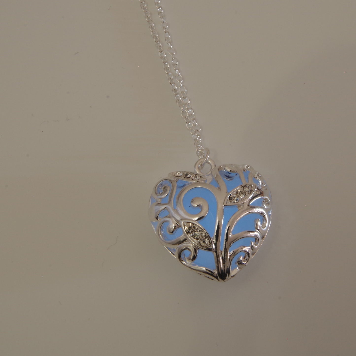 Blue glowing heart necklace Glowing heart of winter jewelry blue heart  glow in the dark Pendant Frozen heart Mothers day gift for mom