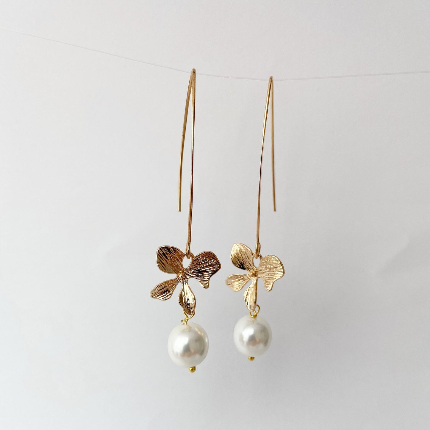 Gold orchid earrings Pearl long dangle flower earrings Floral Bridal jewelry Ivory cream  pearl wedding earrings